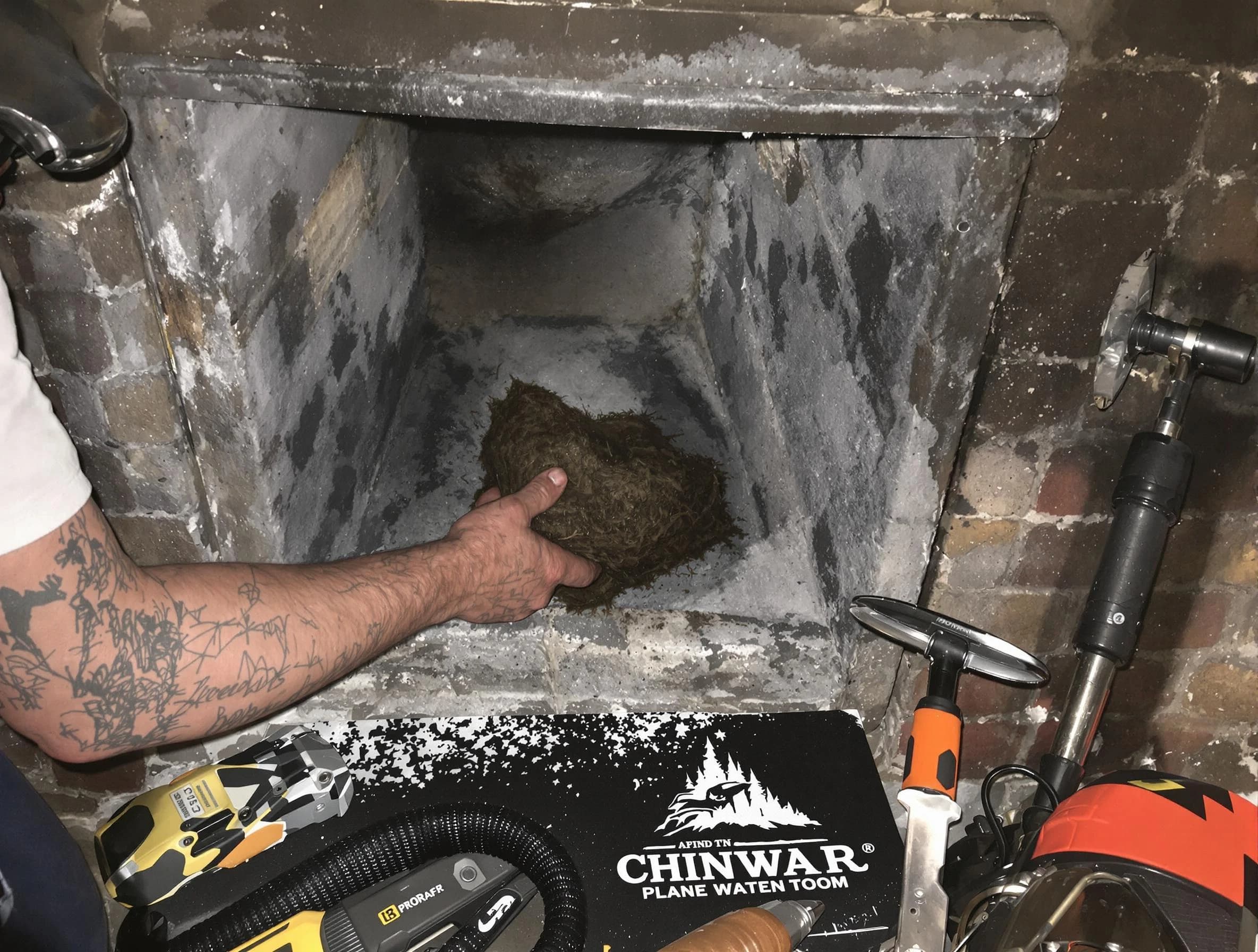 Snellville Chimney Sweep safely removing debris and screening chimney in Snellville, GA